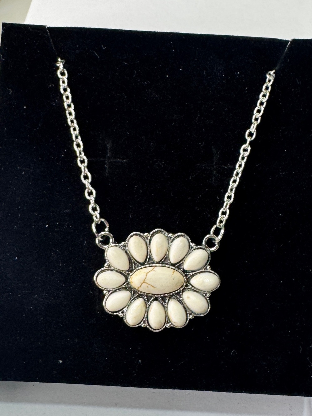 Silver Daisy Pendant Necklace with Cream Stones